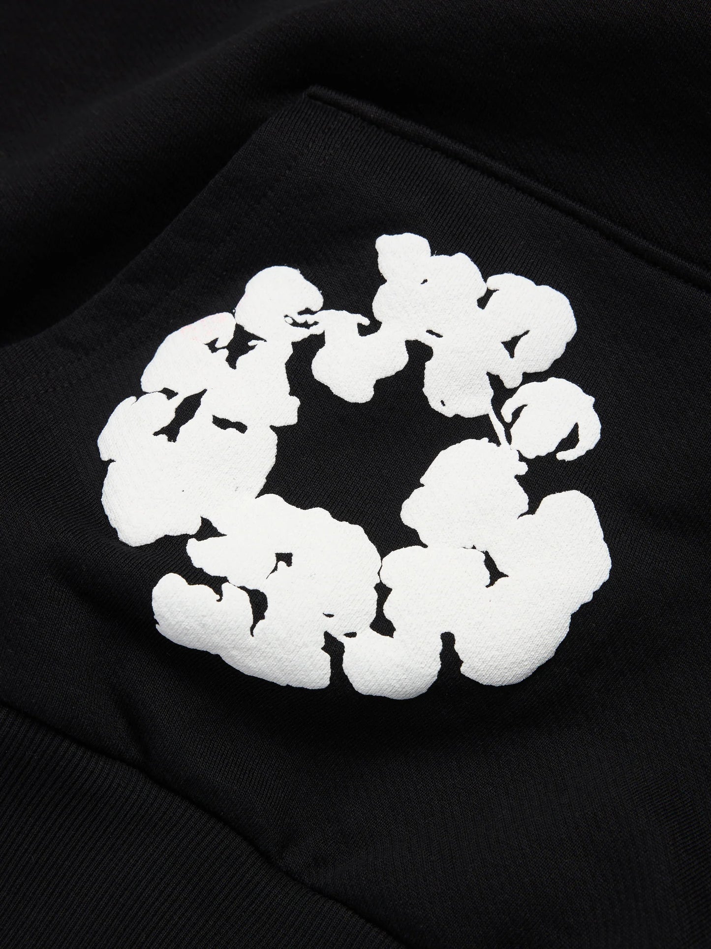 Denim Tears Cotton Wreath Black White Hoodie - close-up fabric and branding detail