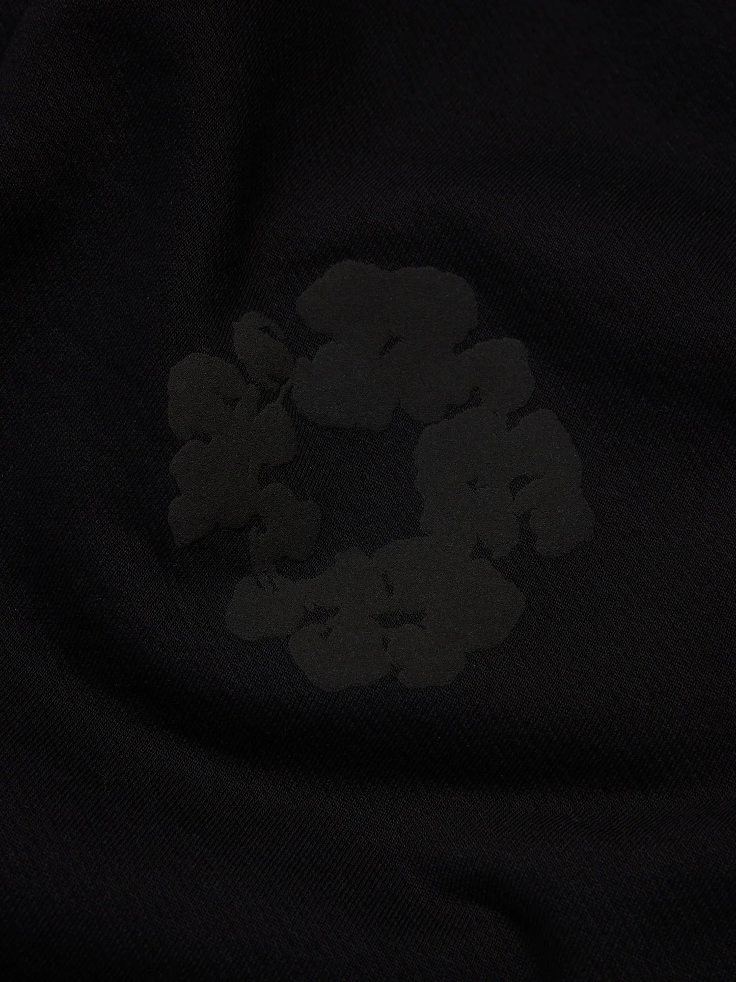 Denim Tears Cotton Wreath Monochrome Bottoms - close-up fabric and branding detail