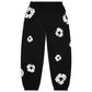 Denim Tears Cotton Wreath Black White Bottoms - front view on white background