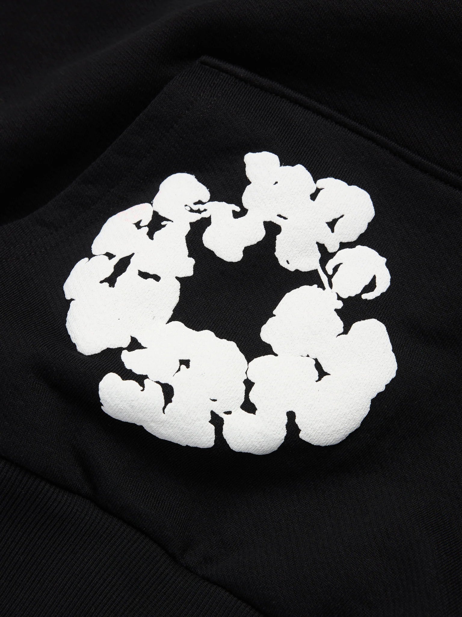 Denim Tears Cotton Wreath Black White Hoodie - close-up fabric and branding detail