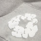Denim Tears Cotton Wreath Grey Hoodie - close-up fabric and branding detail