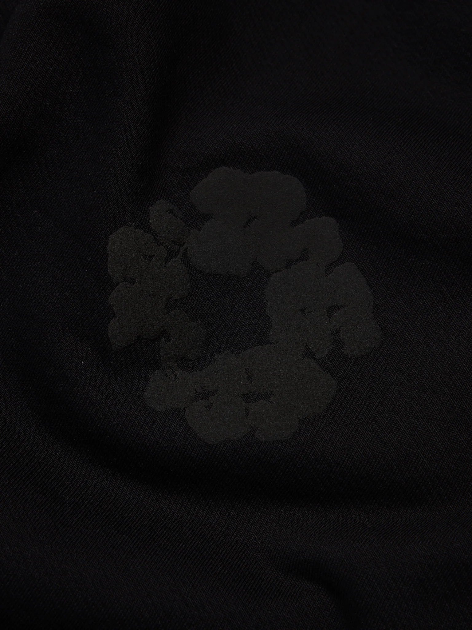 Denim Tears Cotton Wreath Monochrome Bottoms - close-up fabric and branding detail