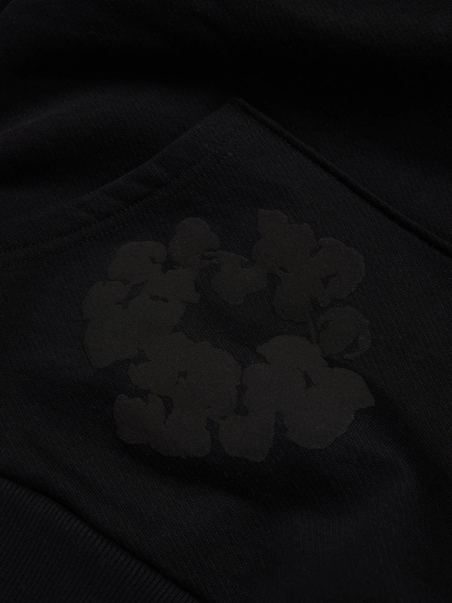 Denim Tears Cotton Wreath Monochrome Hoodie - close-up fabric and branding detail