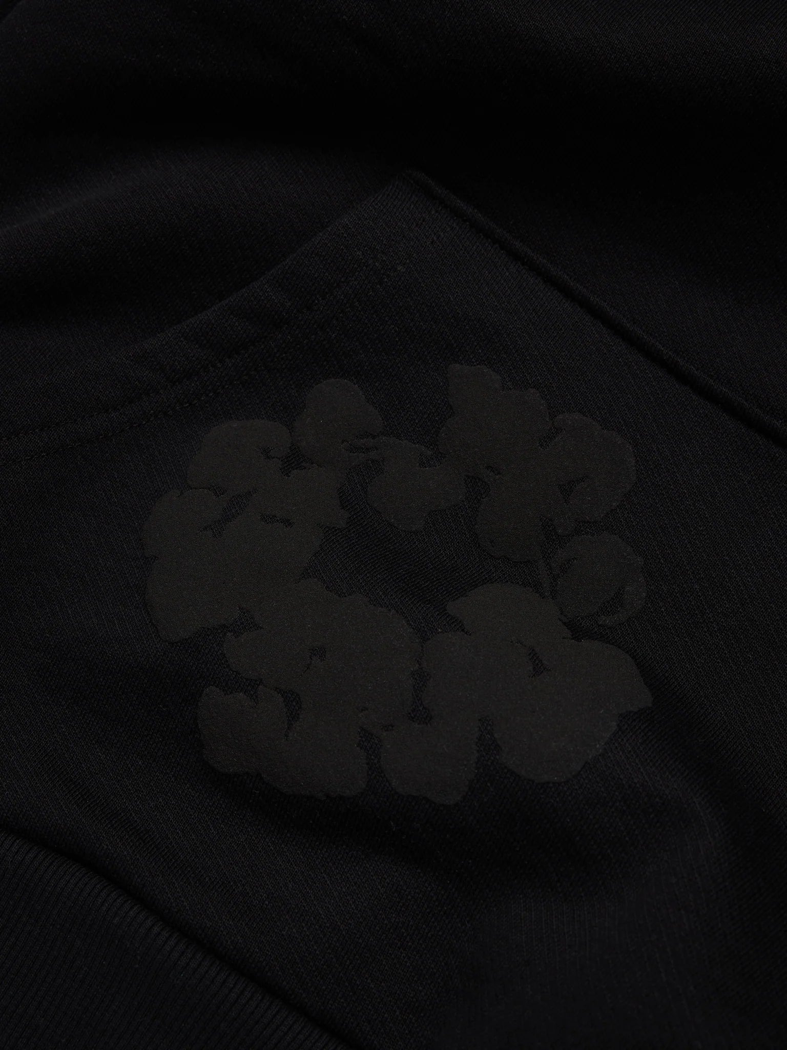 Denim Tears Cotton Wreath Monochrome Hoodie - close-up fabric and branding detail