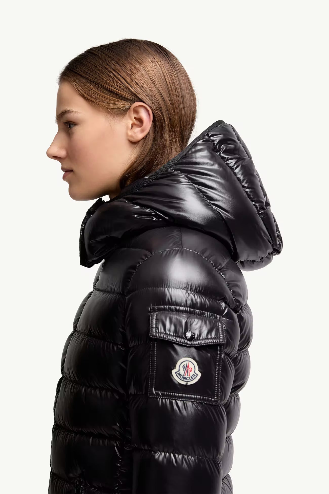 Moncler Bady Womens Black Jacket - Side profile view on female model showing Moncler badge and quilted detail