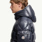 Moncler Maya Dark Navy Jacket - Side profile view on male model showing Moncler badge and quilted detail