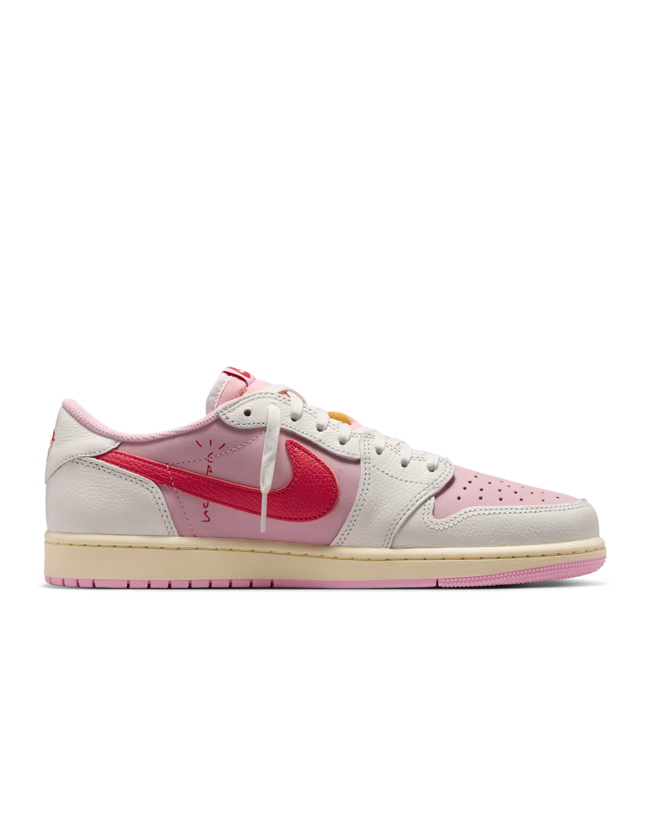 Angled view of Travis Scott Jordan 1 Low Tropical Pink showing pink suede upper and signature reverse swoosh