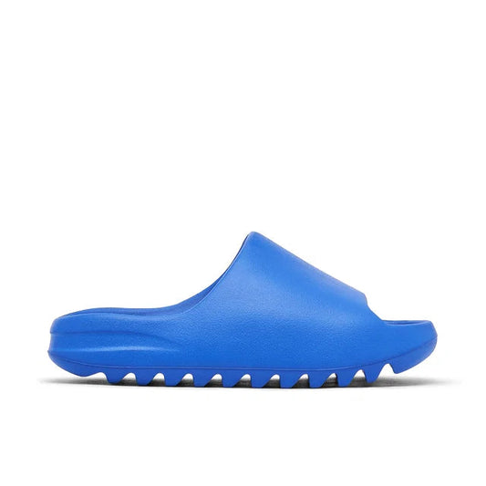 Yeezy Slide Azul Blue - Yeezy Slide side profile view on white background